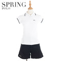 Women's white polo shirt with navy trim by Spring Polo, styled with navy shorts on a mannequin